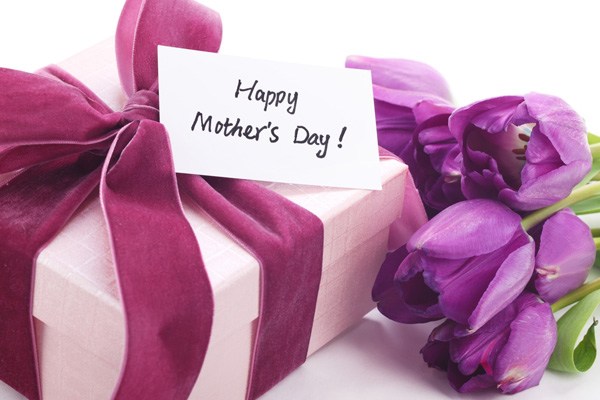 Wrapped present with bow and flowers for Mother's Day